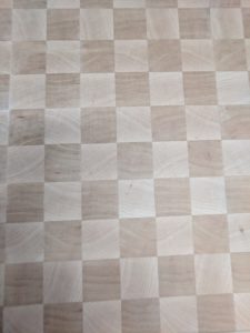 Unfinished checkered surface