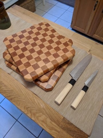 Checkered cherry and maple cutting board
