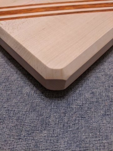 Maple and Paduak stribed cutting board